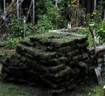 Deck building 32 -Pile of turfs -reminds me of L'Anse-aux-Meadows -small.JPG