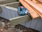 Deck building 45 -Cutting off a joist at an angle -small.JPG