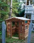 Log building kit from old fence 25 -Parts assembled in the playyard at camp -small.JPG