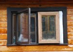 Kitchen window 3 -patched with playhouse window -small.JPG