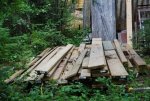 Log building kit new parts at camp 01 -Lumber pile -small.JPG