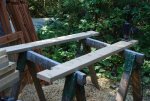 Log building kit new parts at camp 05 -Cutting notches with jig saw -small.JPG