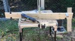 Log building kit new parts at camp 07 -Part clamped on edge for sanding -small.JPG