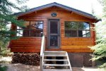 Sanding then re-staining east side of cabin -6 - very small.JPG