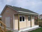 the nearly complete shell with siding and shingles.jpg