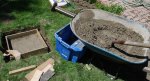 Mixing concrete for the sun dial footing -small.JPG