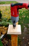 Arbour 30 -Using partly completed cap as a guide for drilling a hole in the top of the posts -sm.JPG