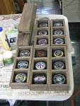 pucks in their cases.JPG