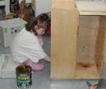 Complex shelving unit 02 -Isla applying varethane -small.JPG