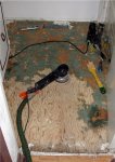 Removing old tiles in bathroom -5 -Removing glue with Rotex sander -small.JPG