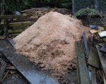 Pile of dust and chips with snow under it -small.JPG