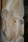 Totem carving 16 -I drilled a hole through the grasp of the paws -small.JPG