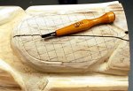 Totem carving 18 -Carving a cross-hatch pattern on the beaver's tail -small.JPG