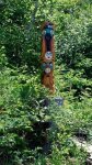 Totem pole temporarily on stump near Tip's Landing -small.JPG