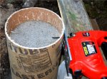 Porch and ramp for cabin 10 -Tube is filled with concrete to level marked by a couple of nails t.JPG