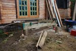 Porch and ramp for cabin 11 -One beam and some joists in place -small.JPG