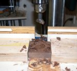 Turning yo-yos 01 -Drilling 35 mm wide 10mm deep hole into with a brass hub is to be glued -smal.JPG