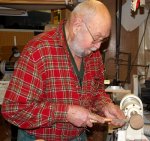 Turning yo-yos 04 -Mack Cameron rounding a walnut side -small.JPG