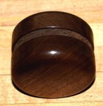 Turning yo-yos 07 _two walnut side turned, sanded, waxed, and polished -small.JPG