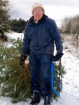 Xmas Tree Farm 4 -Frank dragging the newly sawn down tree -small.JPG