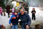 Xmas Tree Farm n -Frank and Ethan on a bench by the bon-fire -small.JPG