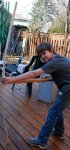 Ethan playing with bow on tiller stick -small.JPG