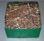 Biscuit tin full of nails.JPG