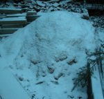 Pile of dust and chips with snow over it -small.JPG