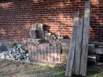 Timbers, smashed blocks, removed bricks, etc. at side of garage (04-22) -small.JPG