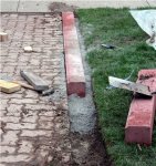 Laying driveway curb (04-28) -small.JPG