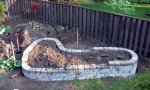 Raised herb garden wall 10 -mostly filled with soil (05-10) -small.JPG