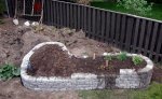 Raised herb garden wall 12 -with some herbs transplanted (05-10) -small.JPG