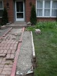 Border under construction between pea gravel and lawn (05-27) -small.JPG