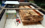 Log building kit from old fence 24 -Parts for 1 small building packed in trailer -small.JPG